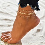 Armband am Knöchel aus Gold und Kristall