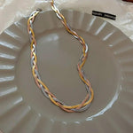 Elegante Halskette in Gold- und Silberfarbe