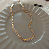 Elegante Halskette in Gold- und Silberfarbe