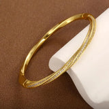 Elegantes Kristallarmband mit zwei Reihen in Gold