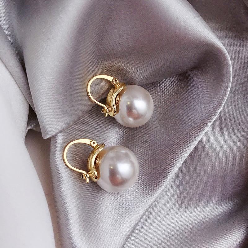 Fette Ohrringe mit Margeriten in Gold