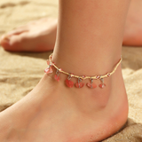 Fusskette aus rotem Kristall und Gold