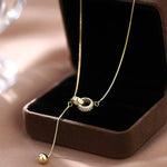 Halskette mit zwei Ringen