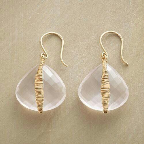 Handgemachte Ohrringe in Gold mit weissem Kristall