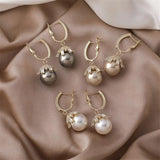 Hängende Ohrringe mit Perlen – Weiss