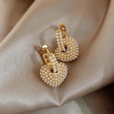 Liebesperlenohrringe in Gold