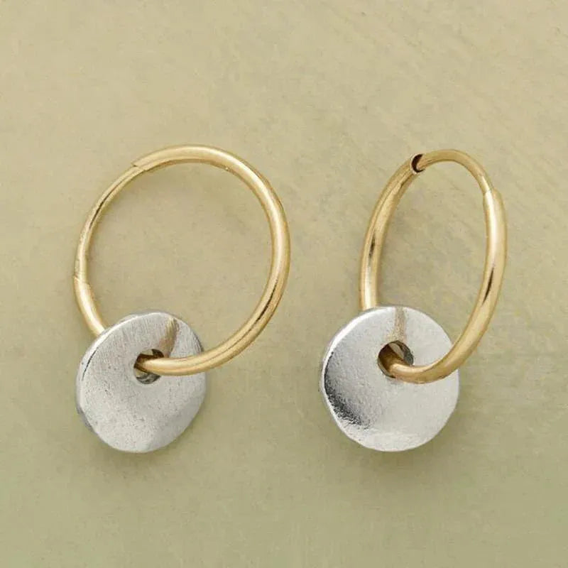 Ohrringe aus Gold und Silber