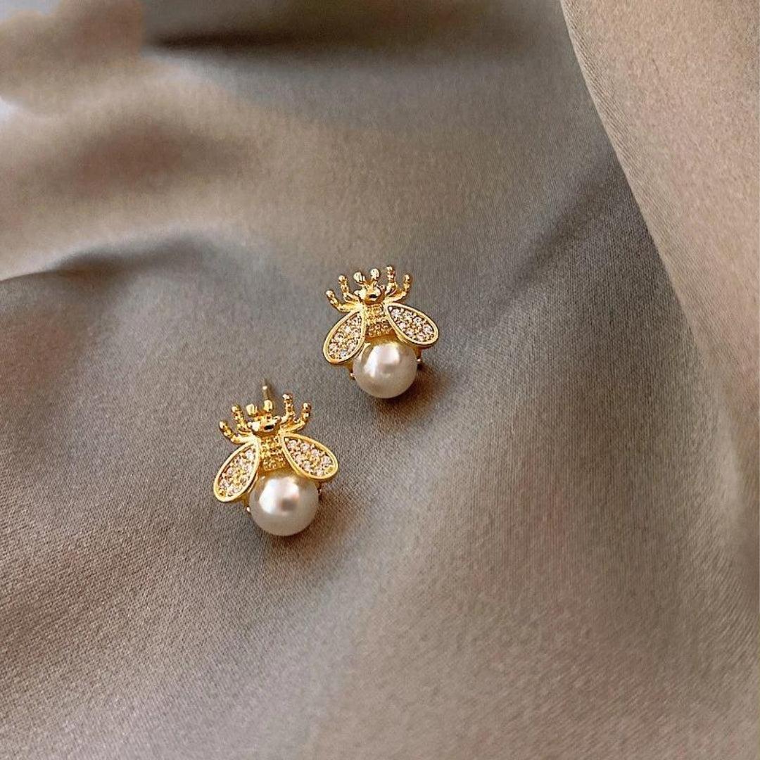Ohrringe aus Perle und Zirkon in Gold