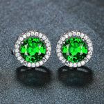 Ohrringe aus Smaragden und Diamanten