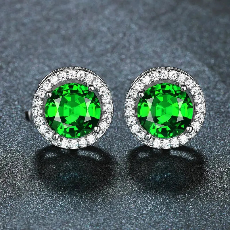 Ohrringe aus Smaragden und Diamanten