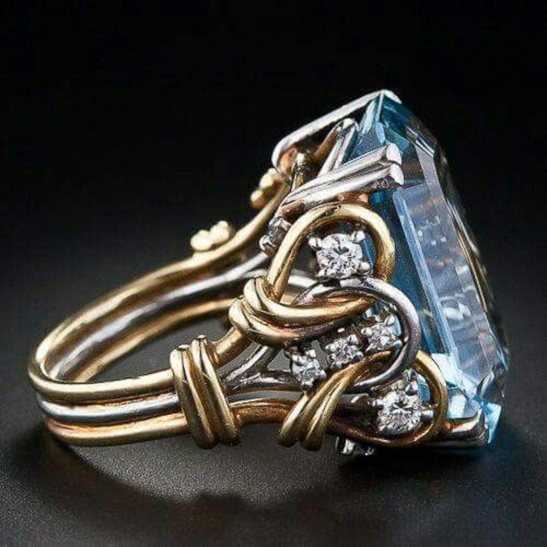Retro-Goldring mit Schichten aus blauen Zirkonien