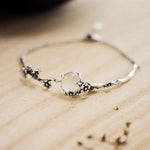 Retro Silberarmband mit Blumenzweig