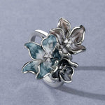 Ring mit exotischer Blume in Silber