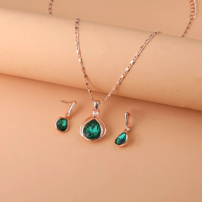Set aus Halskette & Ohrringen aus grünem Kristall und Gold