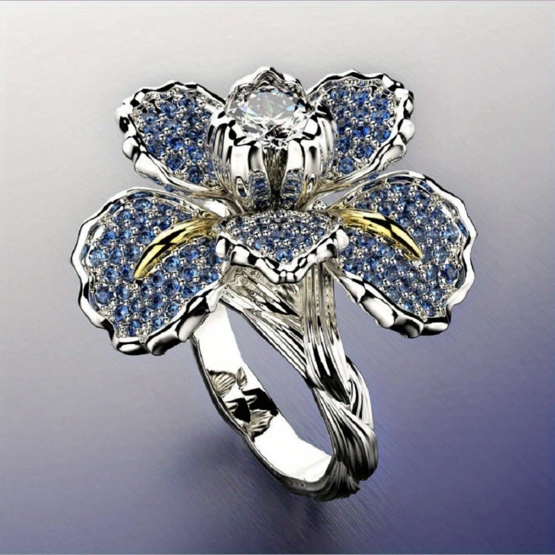 Silberring mit blauem Blüten und Kristall