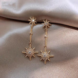 Vintage Gold Ohrringe mit Stern aus Kristall