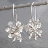 Vintage Ohrringe aus Silber mit unregelmässigen Blumen