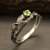 Vintage Ring aus Silber mit grünem Blattstein