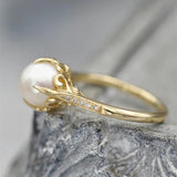 Vintage-Ring mit goldener Perle in der Mitte